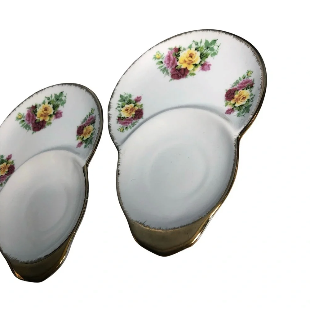 Sitra two (2) Fine ceramic Floral/ gold trim Ceramic Tea saucer/trinket dishes